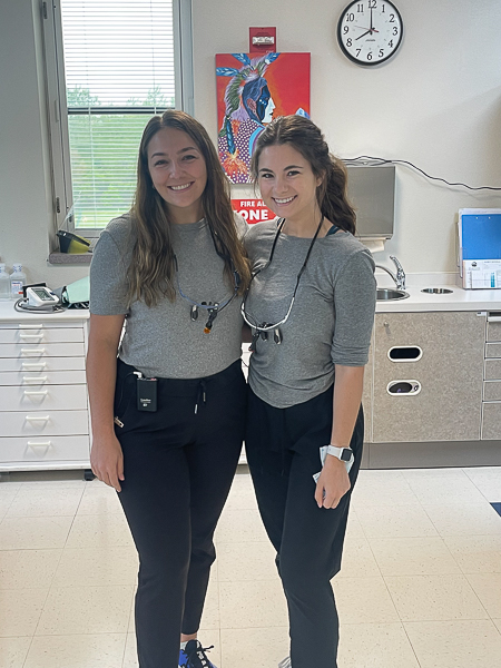 Miranda Anderson, right, pictured with a fellow Creighton dental student at the St. Francis Mission Dental Clinic.