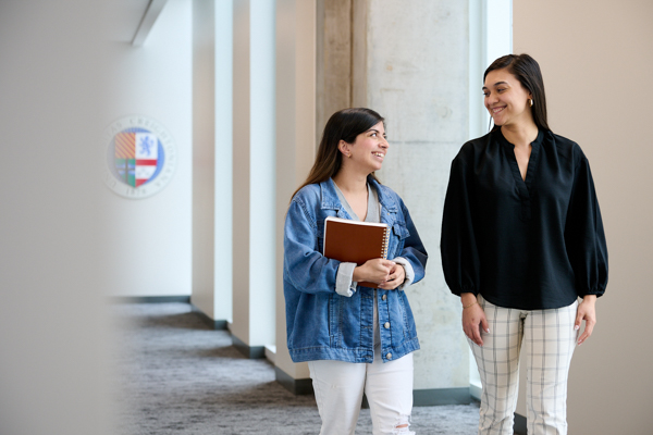 Valeria Garc&iacute;a Lara, right, speaks with a student in the Norton Foundation Success Center.