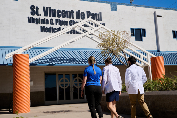 Students walk into the Piper Clinic.
