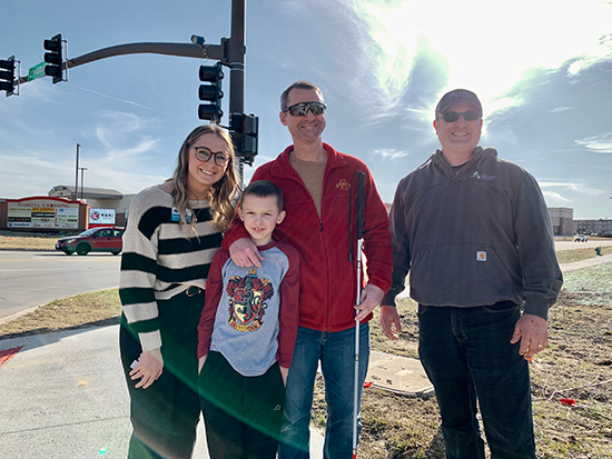 ​  Rachael Barnette, Ben Smith and Brad Smith at the crosswalk.