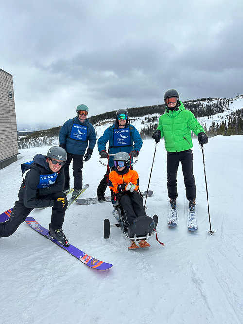 Brody and Michael Rea with Eagle Mount volunteers on Sky Mountain.