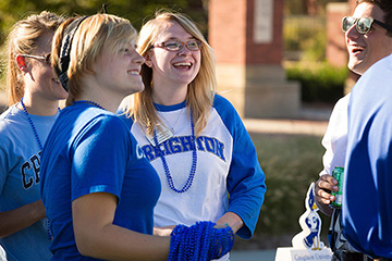 Creighton University alum talking to each other