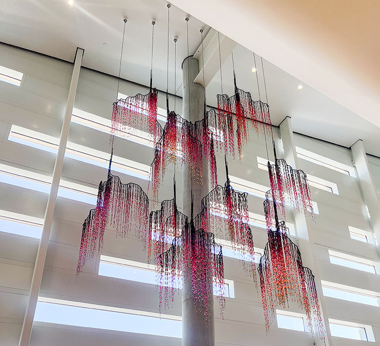 Angie Seycora, BFA&rsquo;09, attached 75,000 plastic beads to a steel overhang