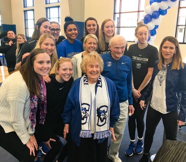 Ruth and Bill Scott, center, with Creighton student-athletes and volleyball head coach Kirsten Booth at The Ruth dedication.