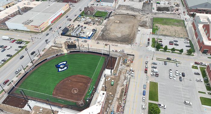 A bird's eye view of the softball field (opening fall 2025) and above, the under-construction baseball practice field (summer 2026).