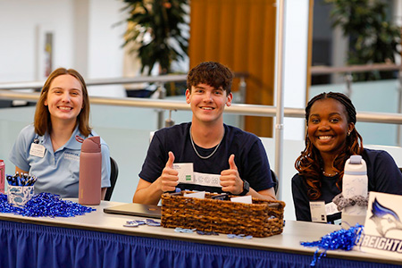 Students fundraising at event Students fundraising at event