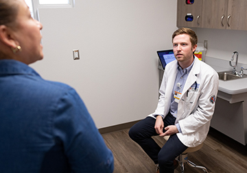 Physician examines a patient at St. Vincent