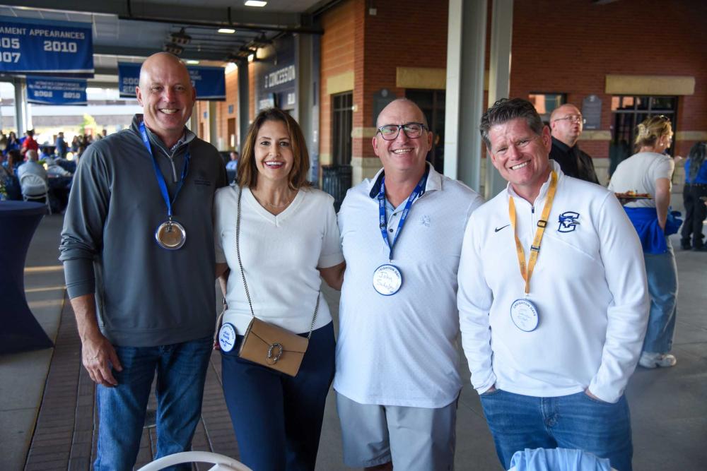 Alumni posing for a photo