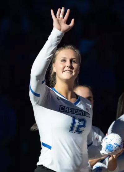 Taryn Kloth waves to the crowd before a Creighton volleyball match