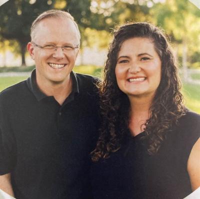 Leslie and Sebastian Fischer pose together for a photo