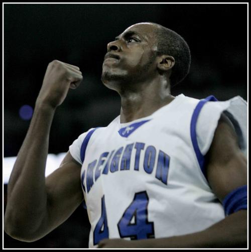 A basketball player pumps his fist