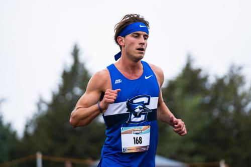 Creighton cross country sophomore Brian Hiltebrand running in a race