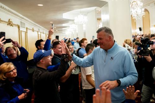 Creighton coach Greg McDermott greets fans at a pregame event