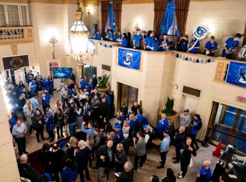 Creighton fans fill a hotel ballroom