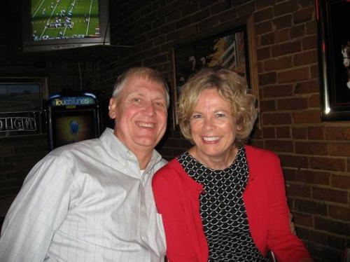 A couple smiles together