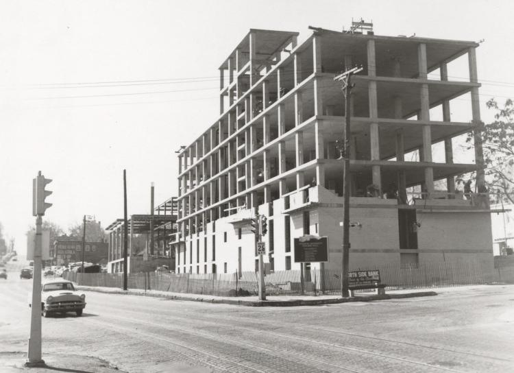 An old photo of a dorm under construction