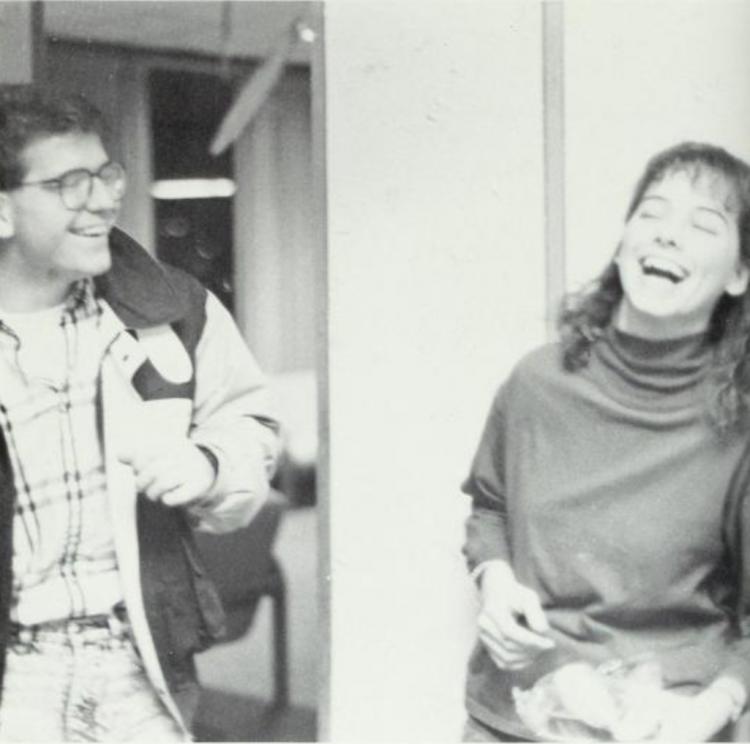 Two Kiewit Hall students laugh together in 1989