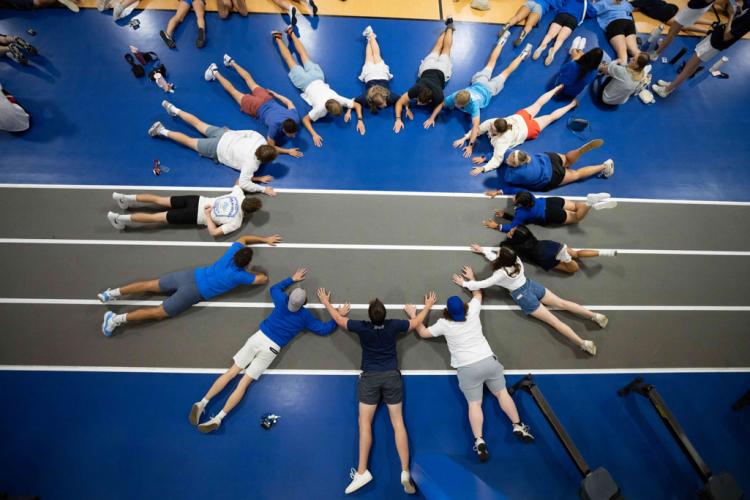 Students participating in a team-building exercise.