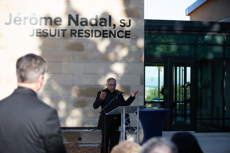 Fr. Nicholas Santos addresses a crowd