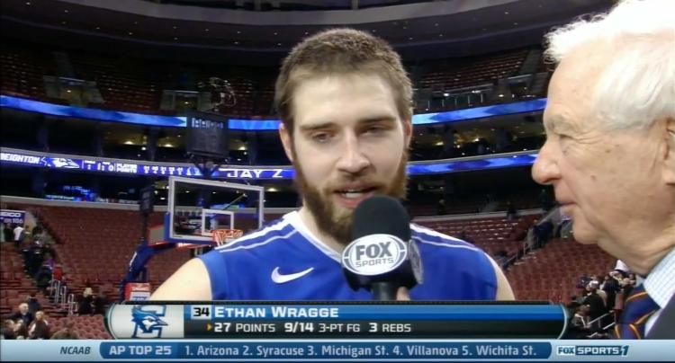 A player is interview by a commentator on TV