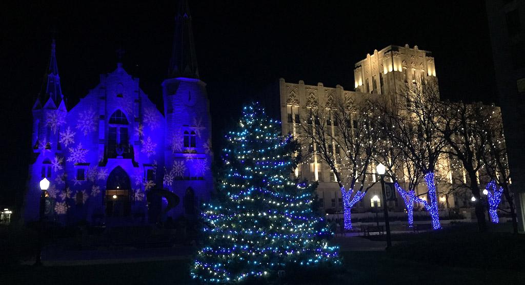 St. John's and Creighton Hall illuminated for the holidays.