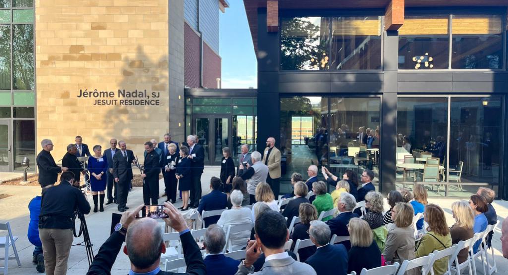 Donors and guests join Creighton leaders for a ribbon cutting ceremony