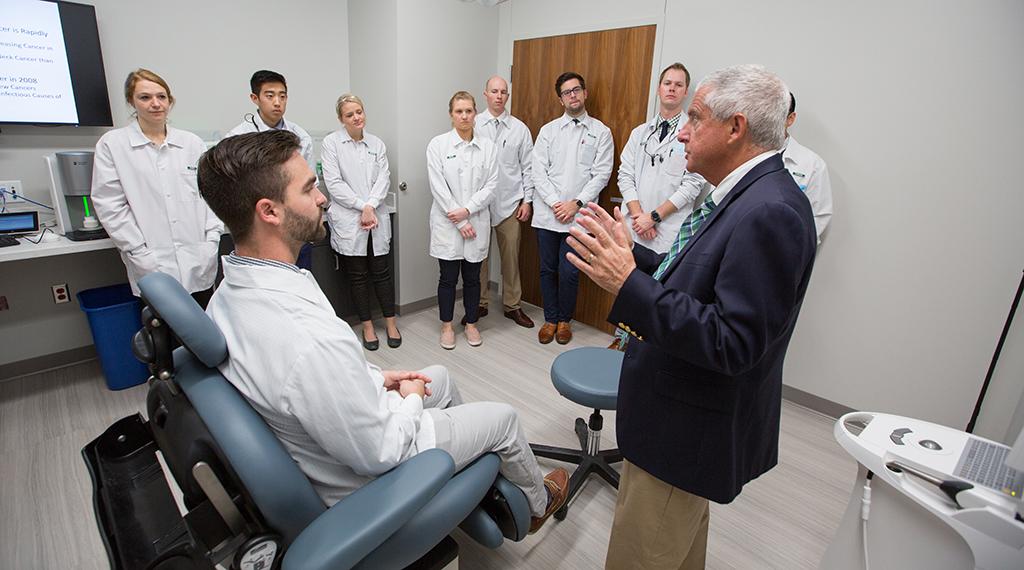 Thomas Dobleman, MD, teaches Creighton dental students how to spot malignancies.