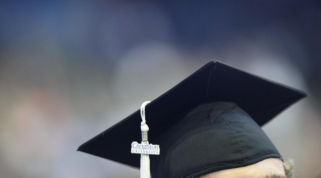 Creighton student wearing graduation cap