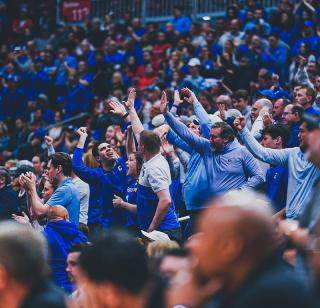 Image of crowd cheering at Creighton men's basketball game.