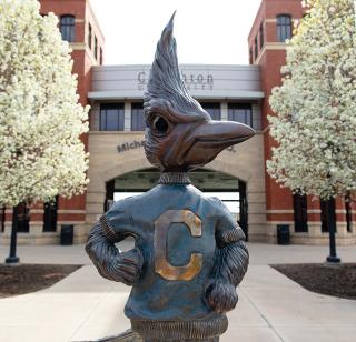 Statue of Billy Bluejay in front of Morrison Stadium.