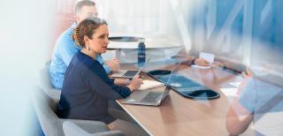 Professional students in conference room