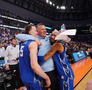 Image of Coach Greg McDermott celebrating with players