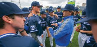 Coach and men's baseball team.