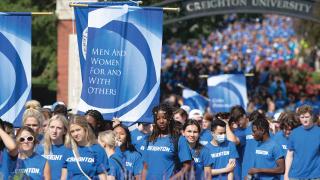 Students walk the Creighton Pathway.