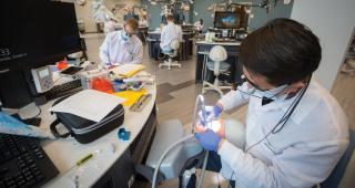 Students work in the simulation lab in the School of Dentistry.