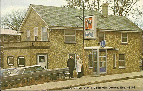 Fr. Cahill and Walt Beal pictured in front of Beal's in 1976.