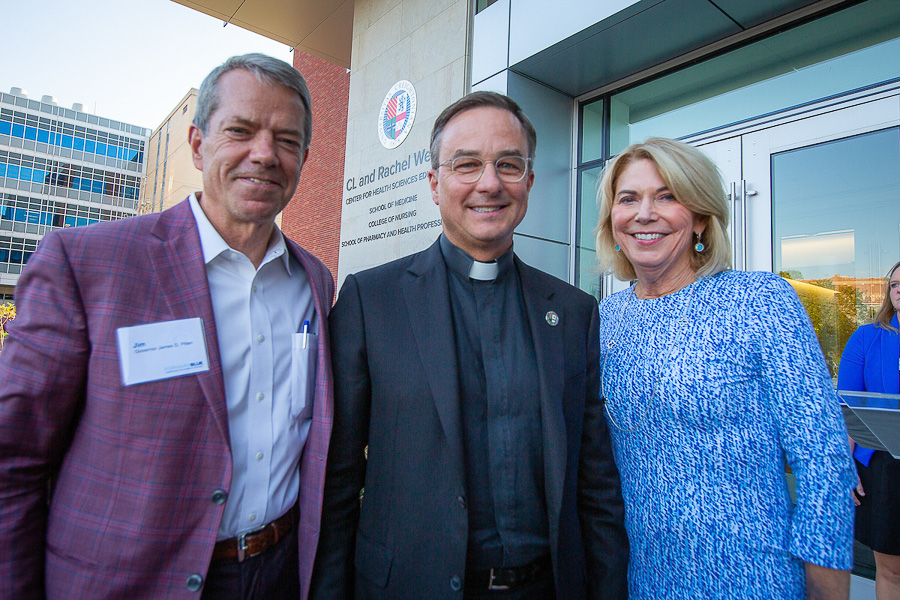 Gov. Pillen, Fr. Hendrickson and Mayor Stothert at the event.