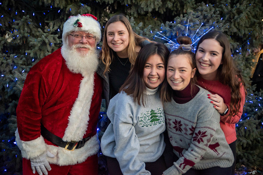 Creighton students pose with Santa.